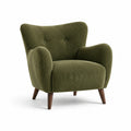 Sillón de pana verde con patas de madera