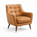 Sillón de piel sintética marrón con patas de madera y detalles metálicos