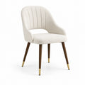 Silla de comedor de bouclé beige con patas de madera y latón